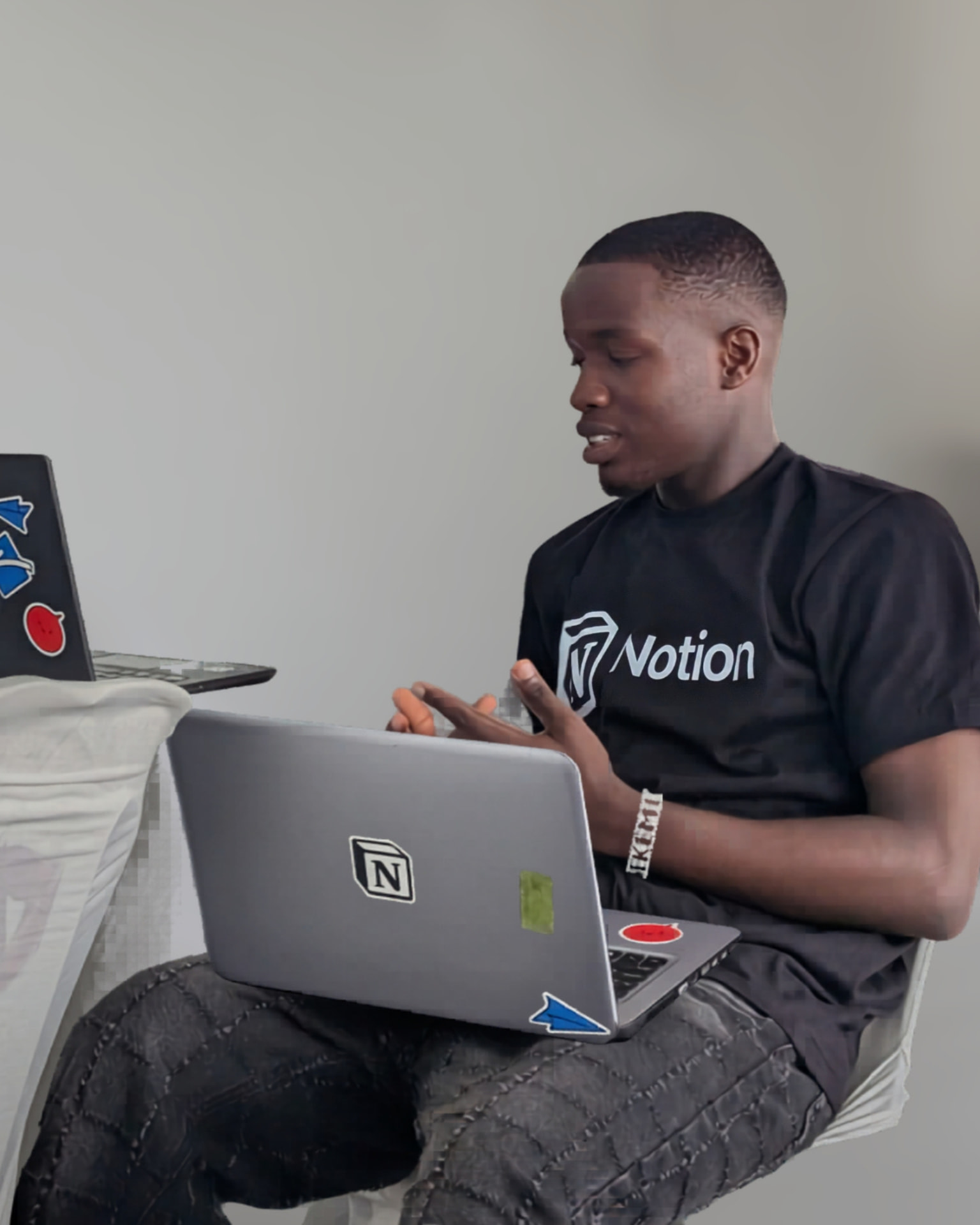 Sekemi Cyril working on social media strategy